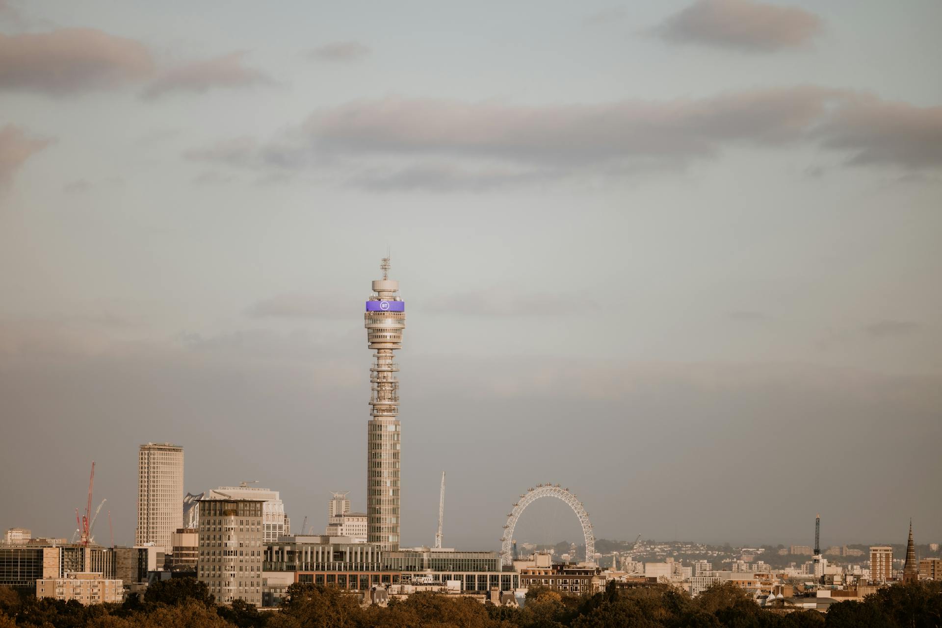 BT Tower overlooking central London with bright blue skies